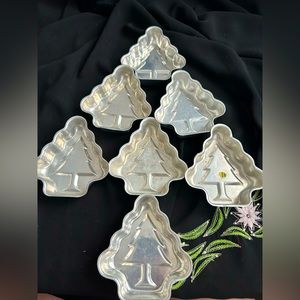 VTG MCM Set of 7 Metal Christmas Tree Jello Molds. One has slight rusting.